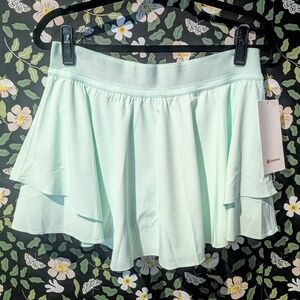 LULULEMON COURT RIVAL HIGHRISE SKIRT IN MINT MOMENT- Dogwood flower embroidery
